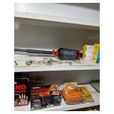 2 shelves of misc, handwarmers etc