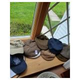 Lot of hats and vhs tapes