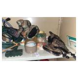 Shelf lot with winter gloves, hose, etc.
