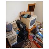 Lot of electronics, computers, monitors,