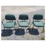3 green office chairs