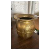 Vintage brass spittoon featuring an embossed