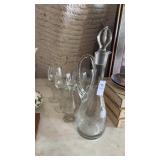Vintage clear glass decanter with matching wine