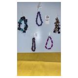 Purple bead & bauble bracelets