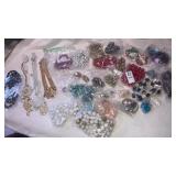 Large assortment of vintage necklaces beads