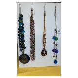 (4) exotic statement necklaces