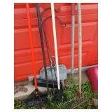 Lot of rakes, brooms etc