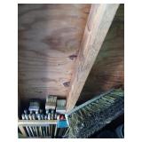 Ceiling lot of brooms and handles and misc