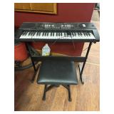 Alesis keyboard and stool