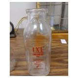 I.X.L pint milk bottle