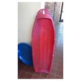 2 plastic sleds