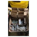 Box of various nuts, bolts, screws, and springs