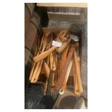 Wooden spoons, spatulas, and a pizza cutter