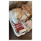 Bin of assorted decor for hanging baskets, flower