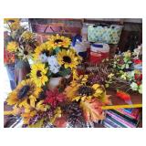 Assortment of picnic baskets & artificial flowers