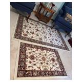 Set of rugs 46 in by 66in and 40 in by 27 in