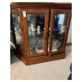 Mirrored glass shelf curio contents separate