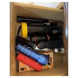 Lot of flashlights and pens