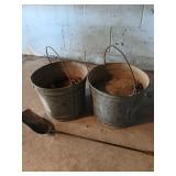 2 galvanized buckets and shovel