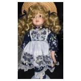 Brinkï¿½s porcelain doll on stand. 14ï¿½ï¿½ tall