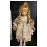 Porcelain doll. 16ï¿½ï¿½ tall. Flower basket and