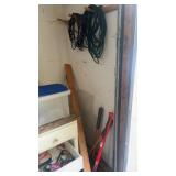 Corner lot of axes, sledgehammers, etc