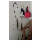 Corner lot of Brooms and bags