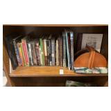 Shelf lot of religious books and films