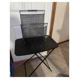 Plastic folding table & heavy metal magazine