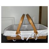Longaberger 1994 gathering basket, a white fabric