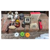 Lot of glasses, religious decor, and birds