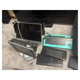Lot of Monitors, Apple, Logitech Keyboards