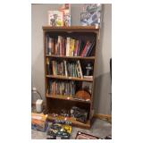 Wooden bookshelf with decorative molding top and
