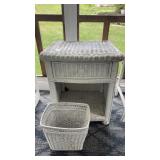 White wicker night stand featuring a drawer and