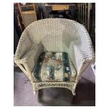 White Wicker Rocking Chair with Floral Cushion