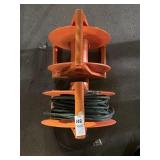 Two Plastic Cord Reels - One with 150ft Cord
