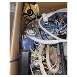 Lot of misc, shower head, rope, battery charger,