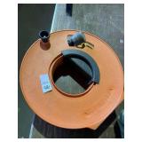 Extension cord on cord wheel