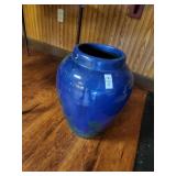 Blue flower vase paint is peeling