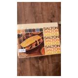Vintage Salton Bun warmer and Leupold smart phone