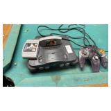 Nintendo 64 console with 2 games and 1 controller