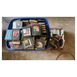 Lot of 8-tracks, cassettes, and a cassette player