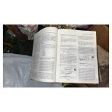 Flight Manual Book with vintage baseball mitt and