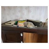 Ammo brass and misc gun related items in wardrobe
