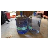 Two Primo 5-gallon purified water jugs