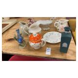 Assorted China Creamers, Saucer, and Basket