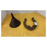 Vintage cast iron horseshoe and oil funnel