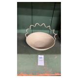 Rustic bowl with a distinct wire handle