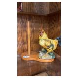 Vintage style rooster figurine with paper towel