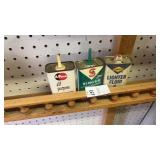 Small oil tins and lighter fluid